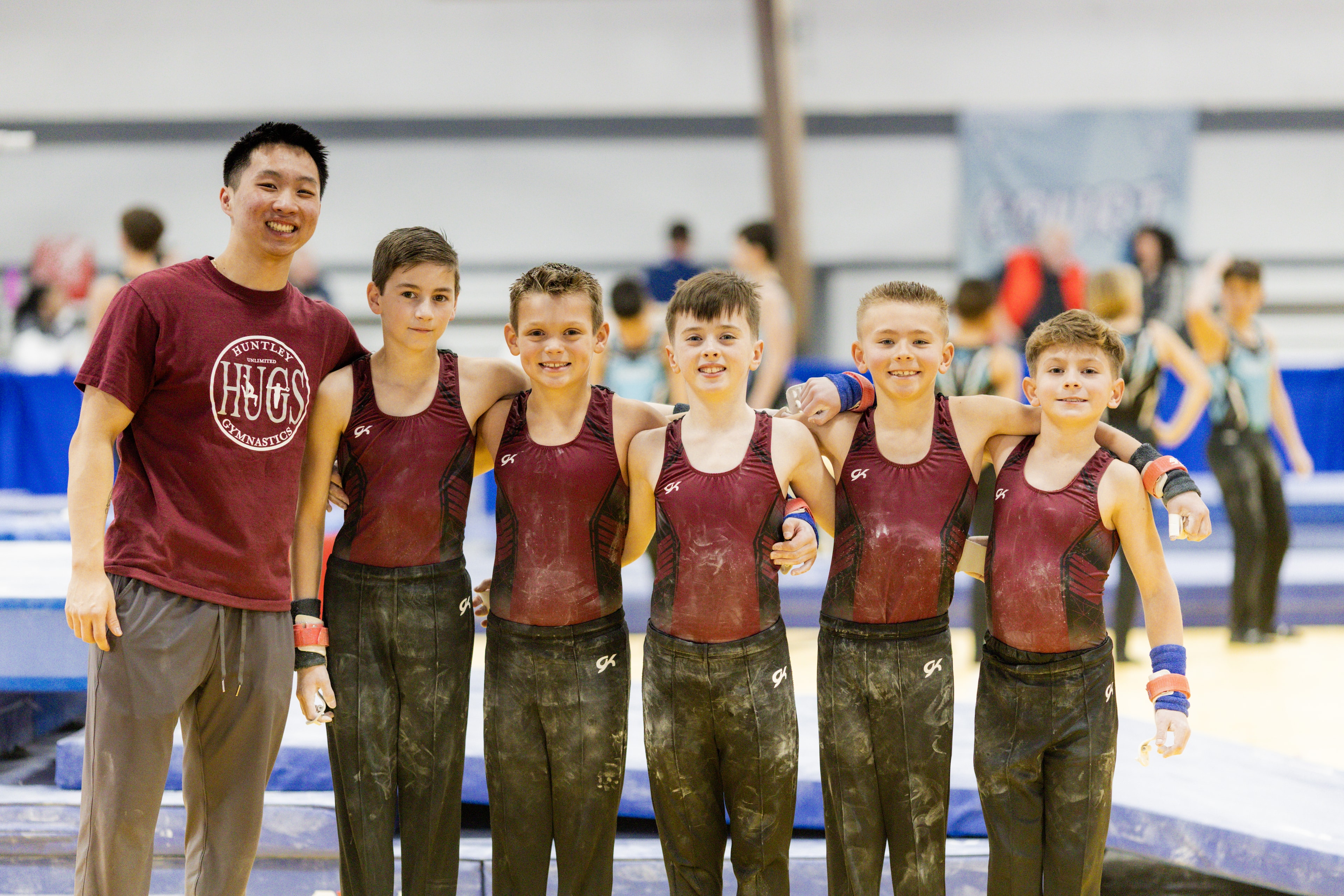 Boys competitive team with coach Al after a meet
